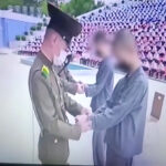 North-Korean-teenagers-handcuffed