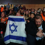 boy-holds_Israeli-flag_Israeli-settler-community