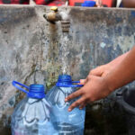 communal-tap-to-fill-water-bottles_Lusaka_Zambia