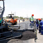 Zambia_Labourers-carry-out-surfacing-work-on-a-road