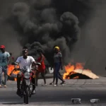 Haiti_protests_burning barricade