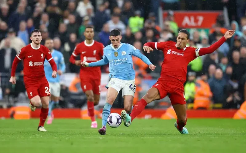 Mac Allister penalty earns 1-1 draw for Liverpool in Man City thriller