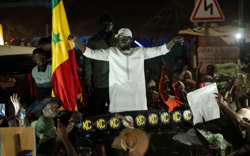 Senegal’s ex-President Wade and party back opposition candidate Faye