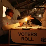 South Africa’s electricity crisis: what political parties say in their election manifestos about solving it Voters cast their ballots by candle light_CPT