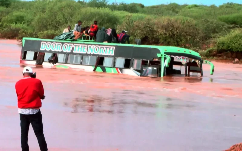 Clinging to ropes, passengers escape bus swept away by Kenya floodwater