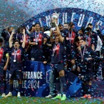 PSG_Kylian Mbappe holds the trophy