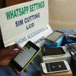 Zimbabwe_street vendor_internet settings_mobile phone