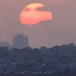sun sets over Gaza