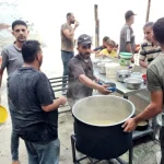 Gaza_preparing food for people