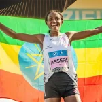 National_pride_Tigist_Assefa_after_breaking_the_world_record_in_Berlin