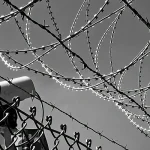 Rich countries are paying poorer ones to manage their refugee crises: 3 reasons this is dangerous barbed wire and security camera
