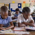children reading in class