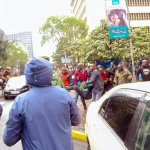 Protestor arrested_Plainclothes police
