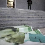 Bashar al-Assad_torn down poster