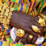 Why is there so much gold in west Africa? person wearing gold jewellery_Ghana