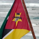 Mazambique flag with ocean