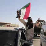 Sudanese man celebrates