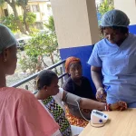 nurse checking a pregnant woman