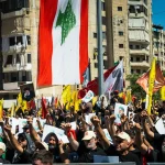 A weakened Iran and Hezbollah gives Lebanon an opening to chart path away from the region’s conflicts − will it be enough? Hezbollah demonstration_Beirut