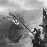 Raising a flag over the Reichstag