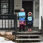 There are long-lasting, negative effects for children like Liam Ramos who are detained, or watch their parents be deported Children hold signs_anti-ICE_Minneapolis