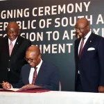 Ramaphosa_Elombi_Tau