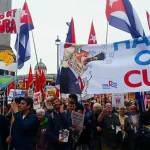 As Trump threatens to force change, what do Cubans want and what do they fear? hands of cuba_protests
