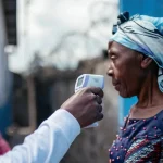 Ebola_health worker_temp-check