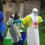ebola_health worker_decontaminate
