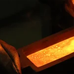 gold refinery_ingot_pouring