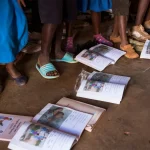 Malawi’s education choices in the wake of aid cuts Malawi_Students textbooks